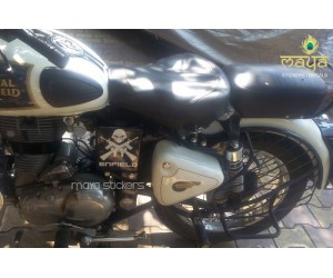 Skull and crossed guns stickering on white royal enfield classic 350 battery box
